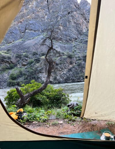 view of middle fork of salmon river from a tent on a spring rafting trip