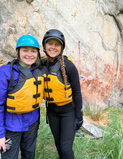 two girls on a spring whitewater rafting trip in Idaho