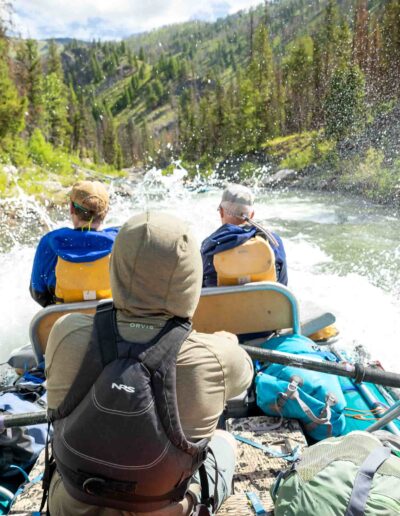 raft going through a wave on the river