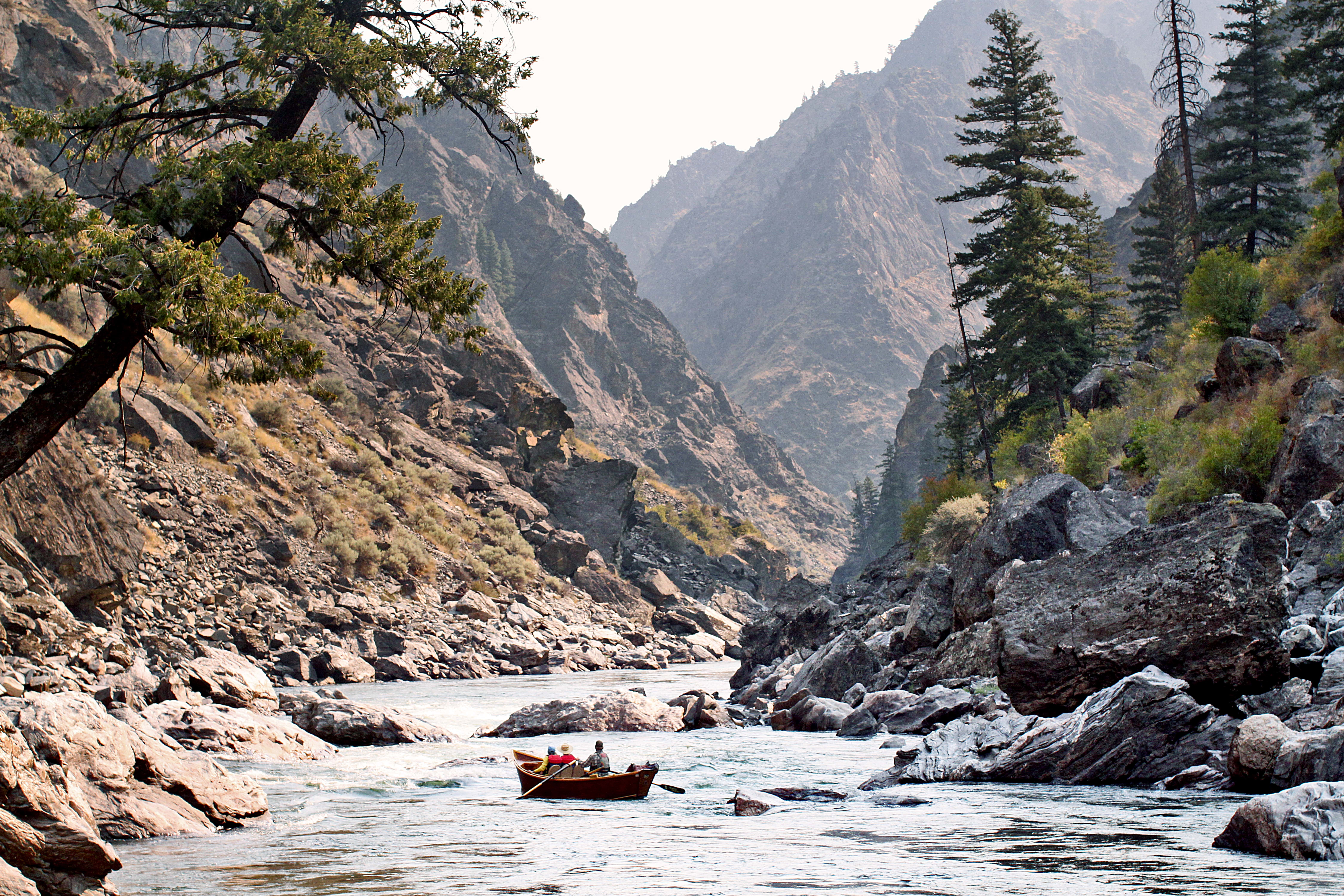Drift boat going through House of Rocks rapid on Middle Fork Salmon