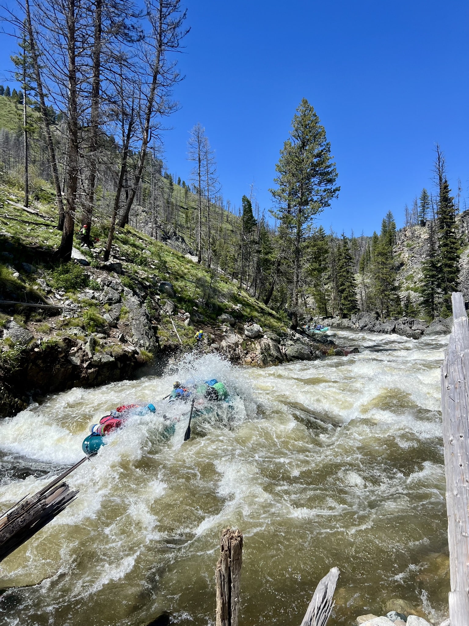 boat going through Velvet Falls rapid on the Middle Fork