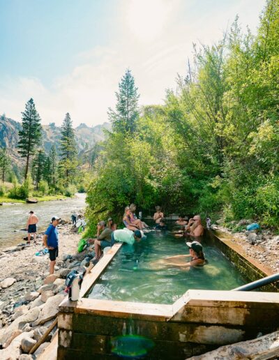 Guests soaking in Loon Creek hot springs on the Middle Fork Salmon River