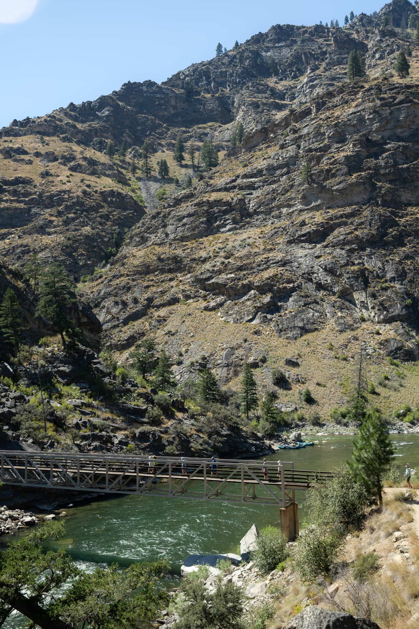 The bridge above Big Creek is the last crossing over the Middle Fork Trail, built of steel between granite cliffs. 